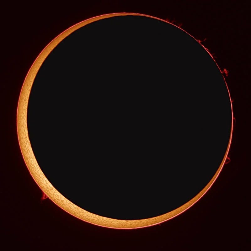 Total solar eclipse revealing celestial alignment