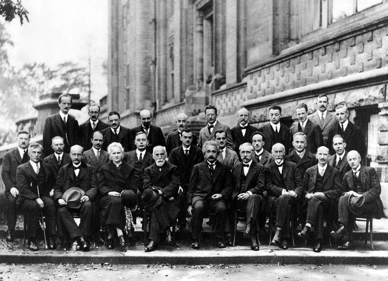 Image illustrating a historical conference predominantly attended by white men