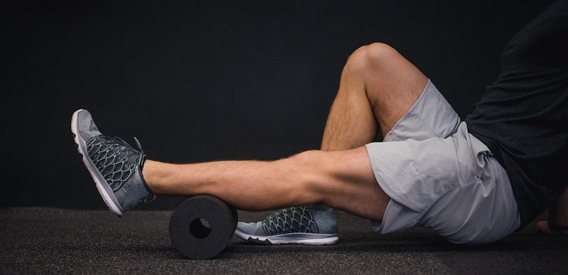 Foam rolling calves for improved mobility