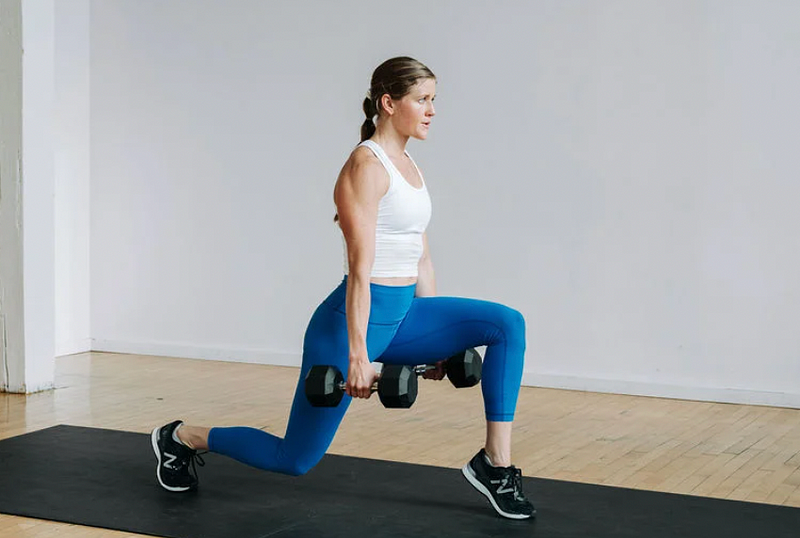 Executing stationary lunges with calf raises for strength